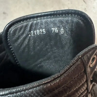 GUCCI 2010年代アーカイブの黒レザーハイカットスニーカー。サイドに赤と緑のウェブストライプ（シェリーライン）を配したミニマルなデザイン。